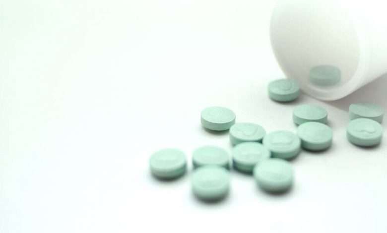 pills spilled out from container